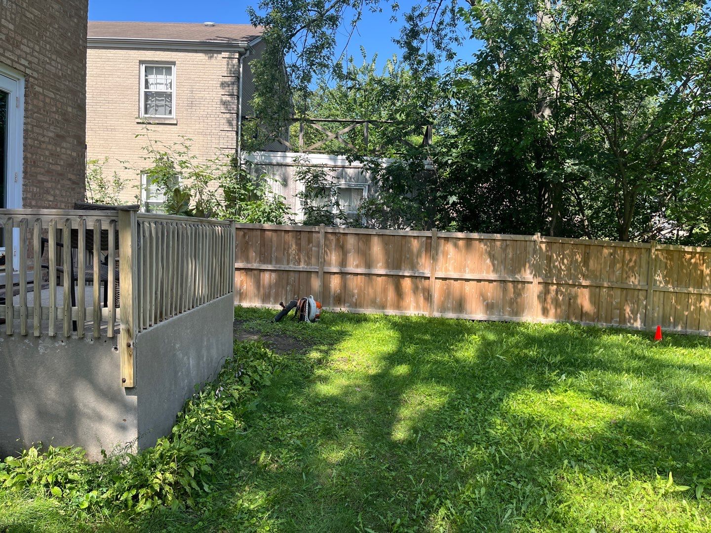 Wood fence cleaning and sealing by Northern Power Washing LLC.