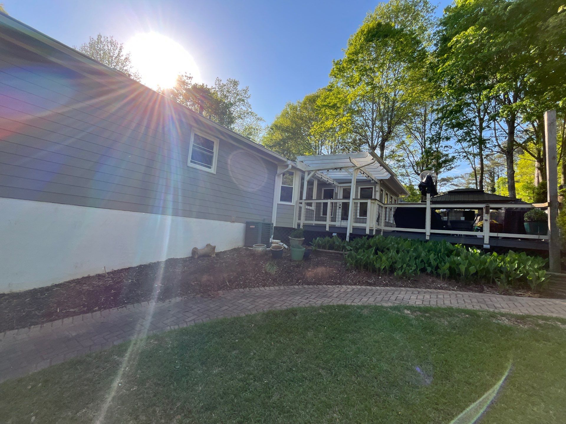 Window, Siding, & Rotten Wood Replacement with Exterior Painting in Woodstock, GA by Nelson Exteriors 