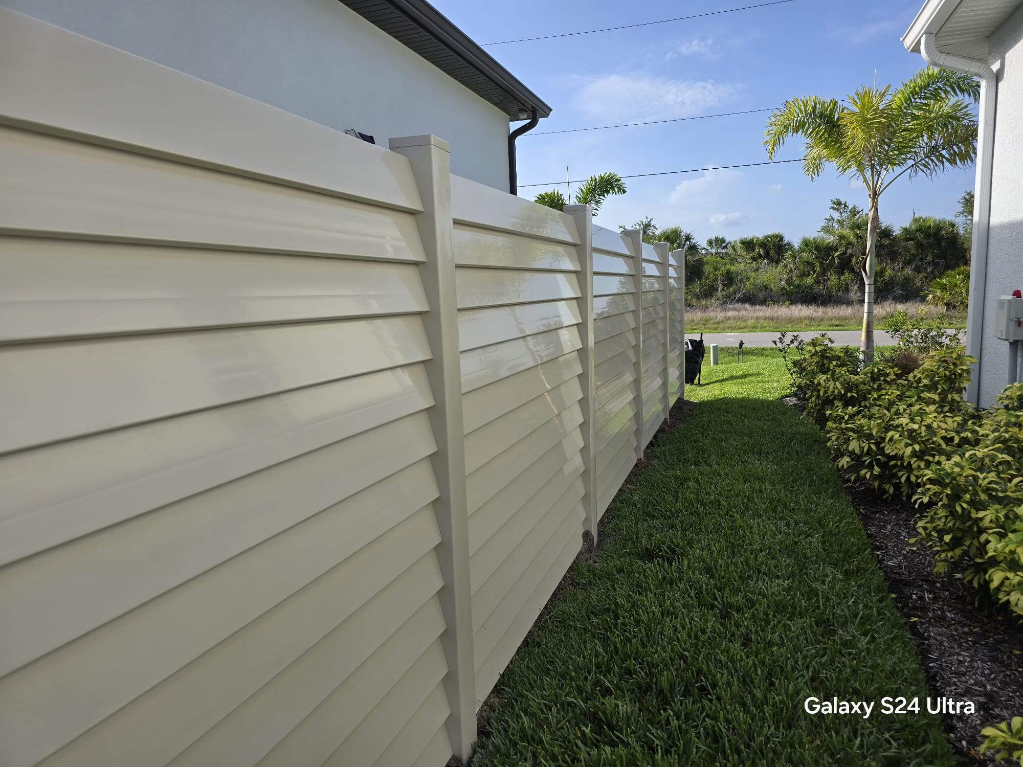 Tan Louvered Vinyl in Port Charlotte by True Fence LLC