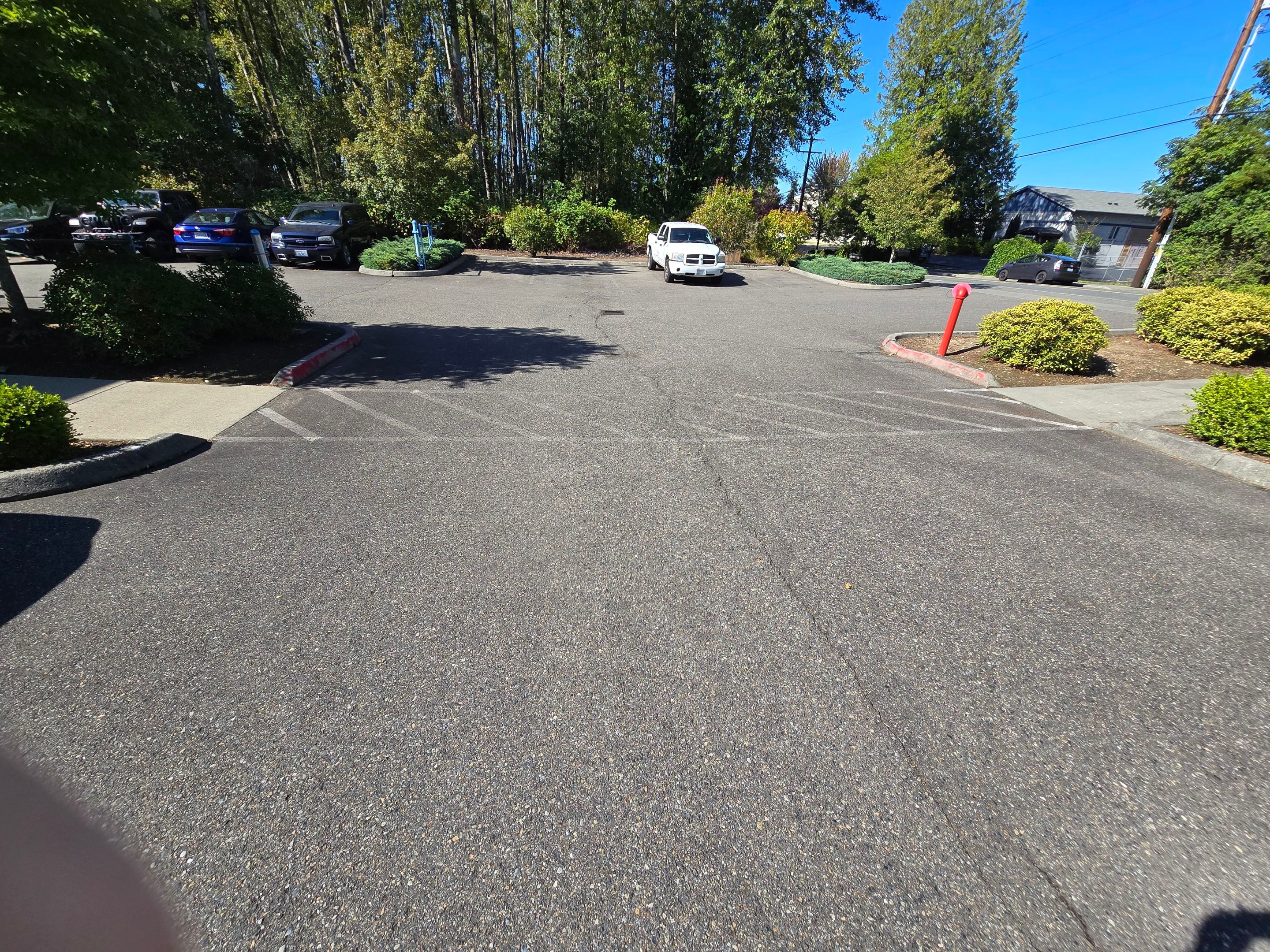 King Machine Business Parking Lot Sealcoat Overlay | Mukilteo by Jireh Asphalt & Concrete Inc 