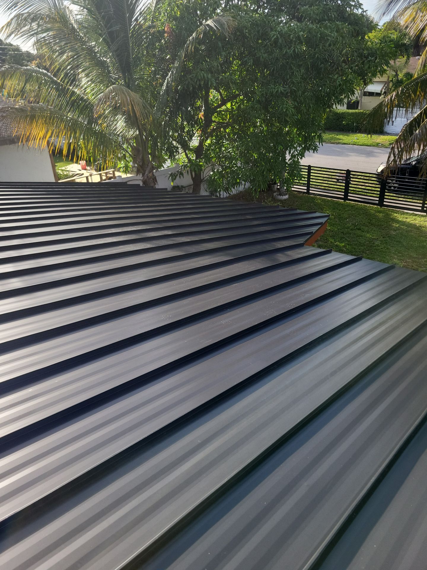 Metal Roof - Matte Black Color. Metal Alliance. by Art's Roofing & Construction