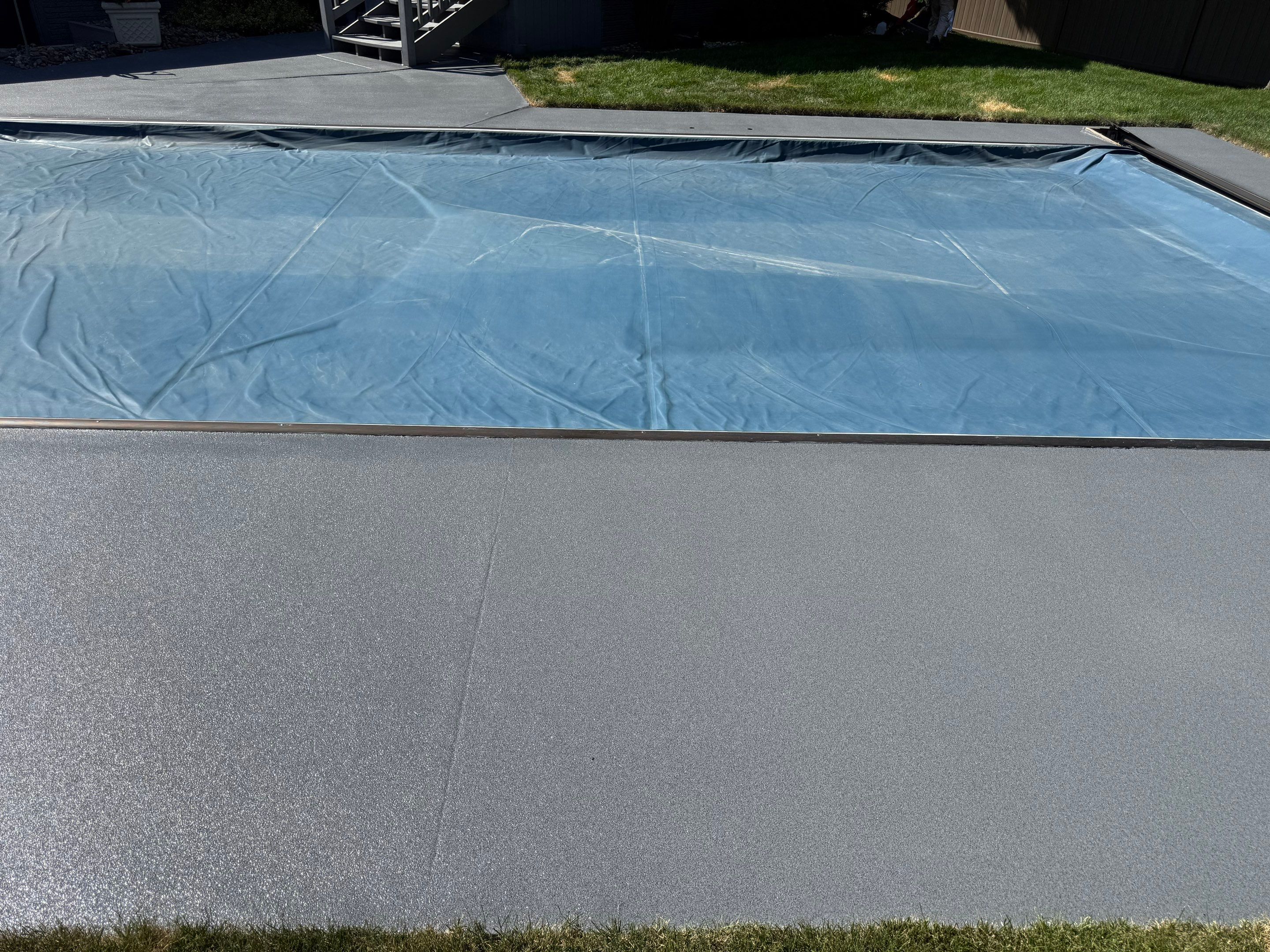 Residential Pool Deck Resurfacing in Sioux Falls by Select Painting, Coatings & Garage Cabinets