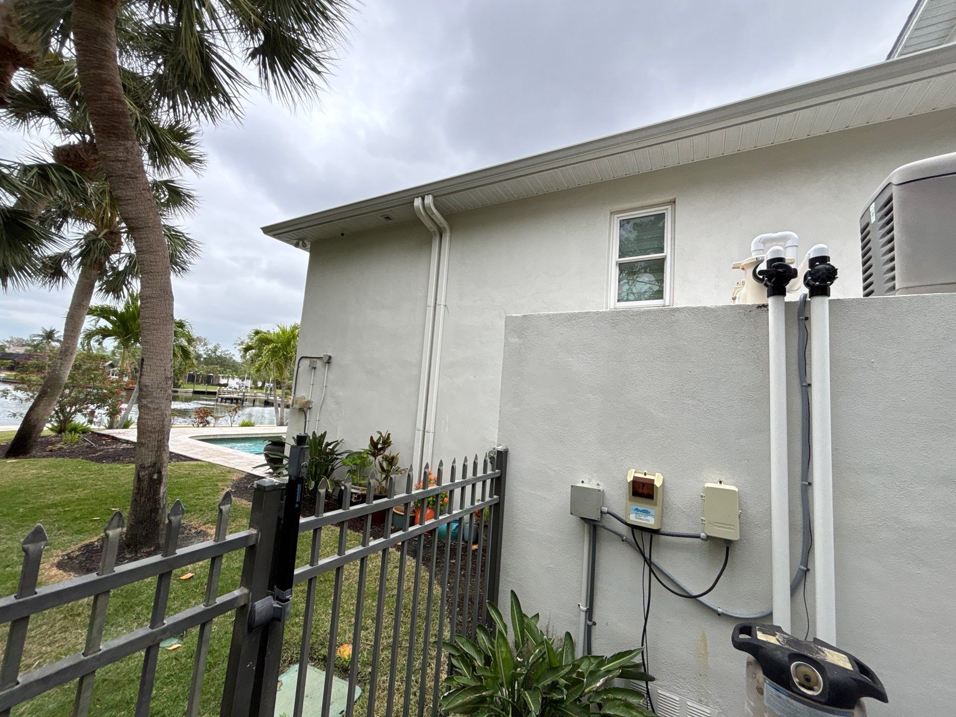 6-Inch White Seamless Gutters Installation in Siesta Key FL by Gutter Professors