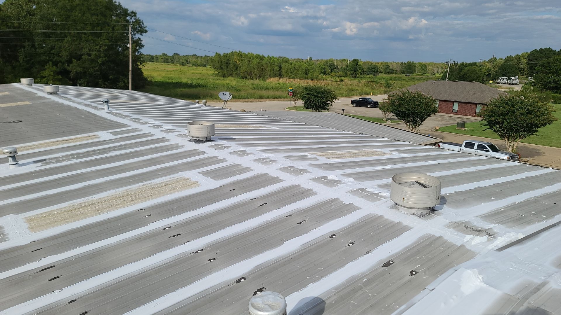Commercial Metal Restoration System using Aldocoat Coatings by Hostetler Roofing