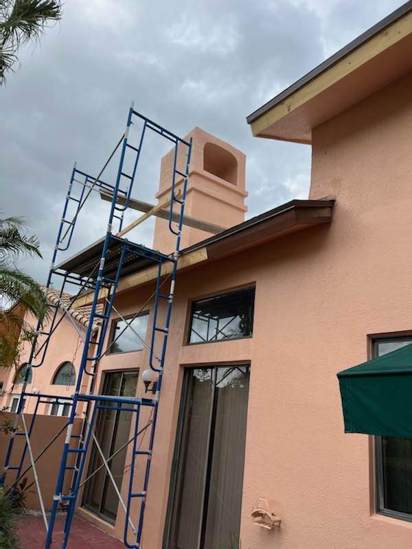 Complete Chimney Rebuild + Tile & Flat Re-Roof  by Morton Roofing, Inc.