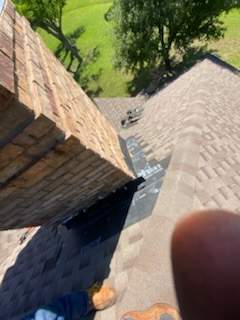 Cricket and Flashing Repair  by Rhino Roofing and General Contracting, LLC