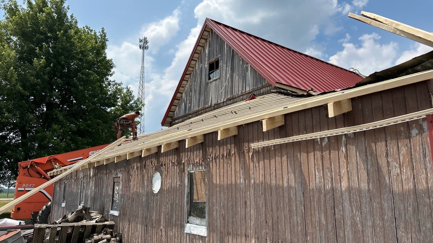 Residential Roofing Installation using Standing Seam Metal - Barn Red by RoofX 