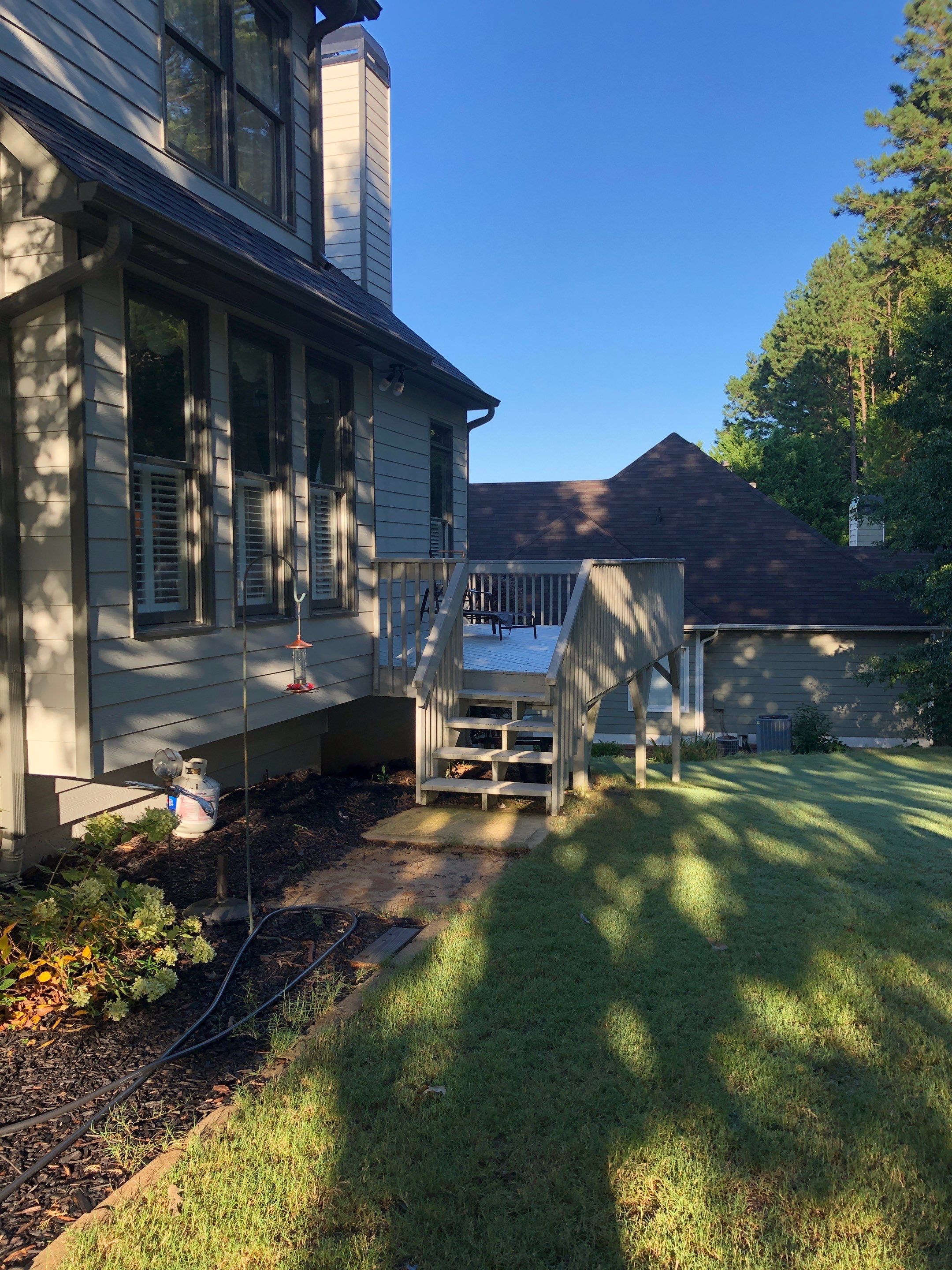 Custom Screened Porch Addition and Wood Deck in Acworth by Swift Home Renovations
