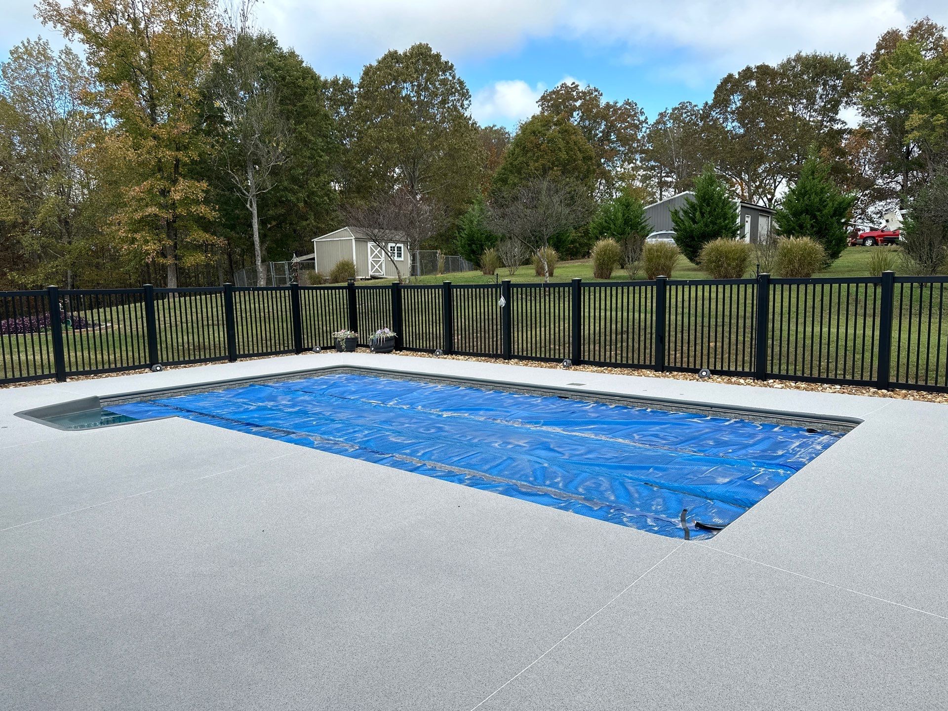 Pool Deck & Sidewalk using Quicksand & Obsidian by Elite Floor Solutions