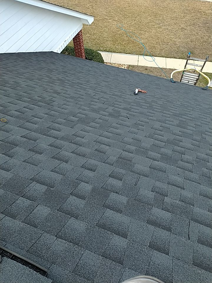 Residential Roofing Installation using Roof Replacement by American Roofing & Construction LLC