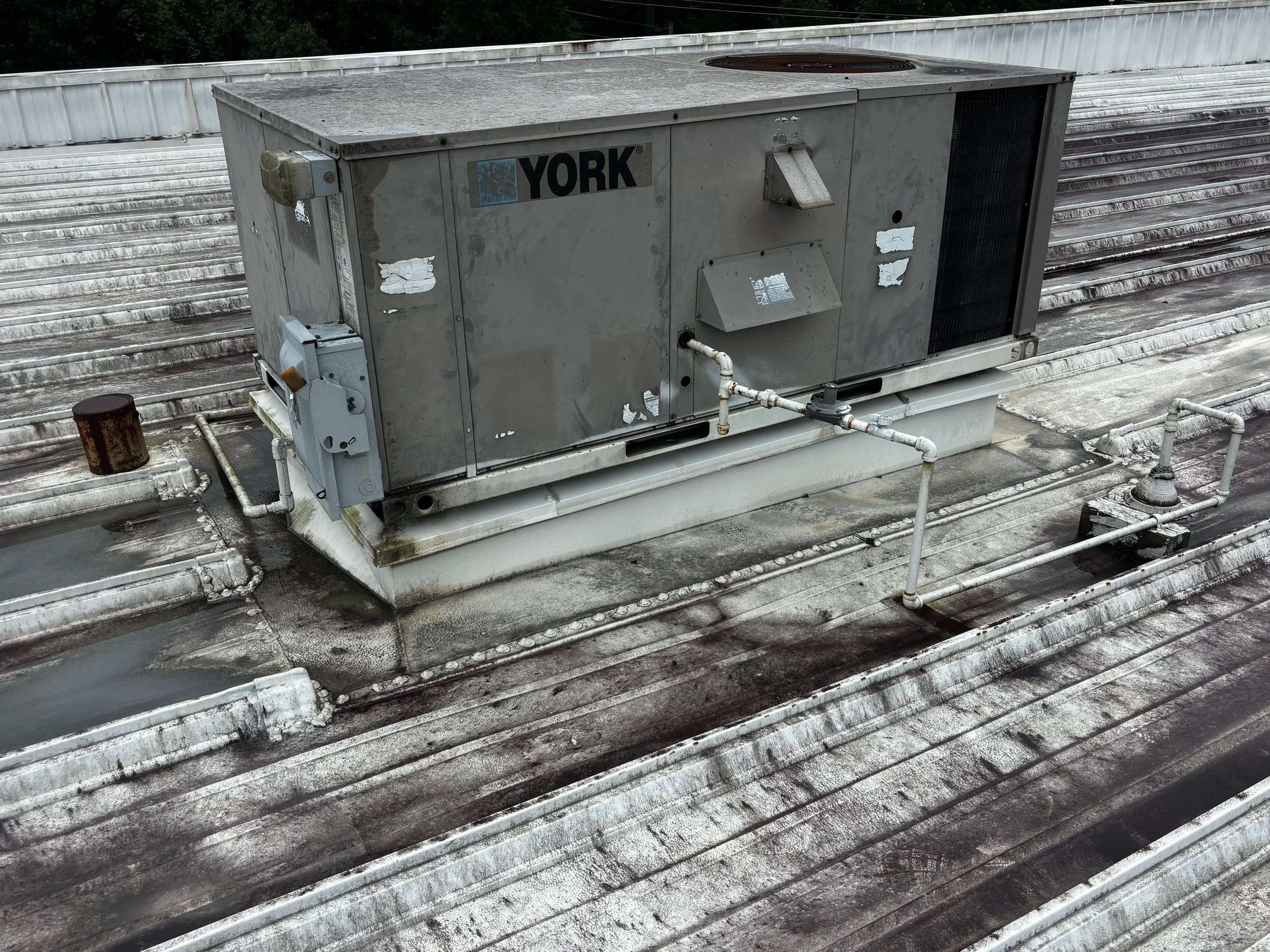12,180 SQ Ft Commercial Metal Roof Restoration in Clarkston by Southern Roof Solutions