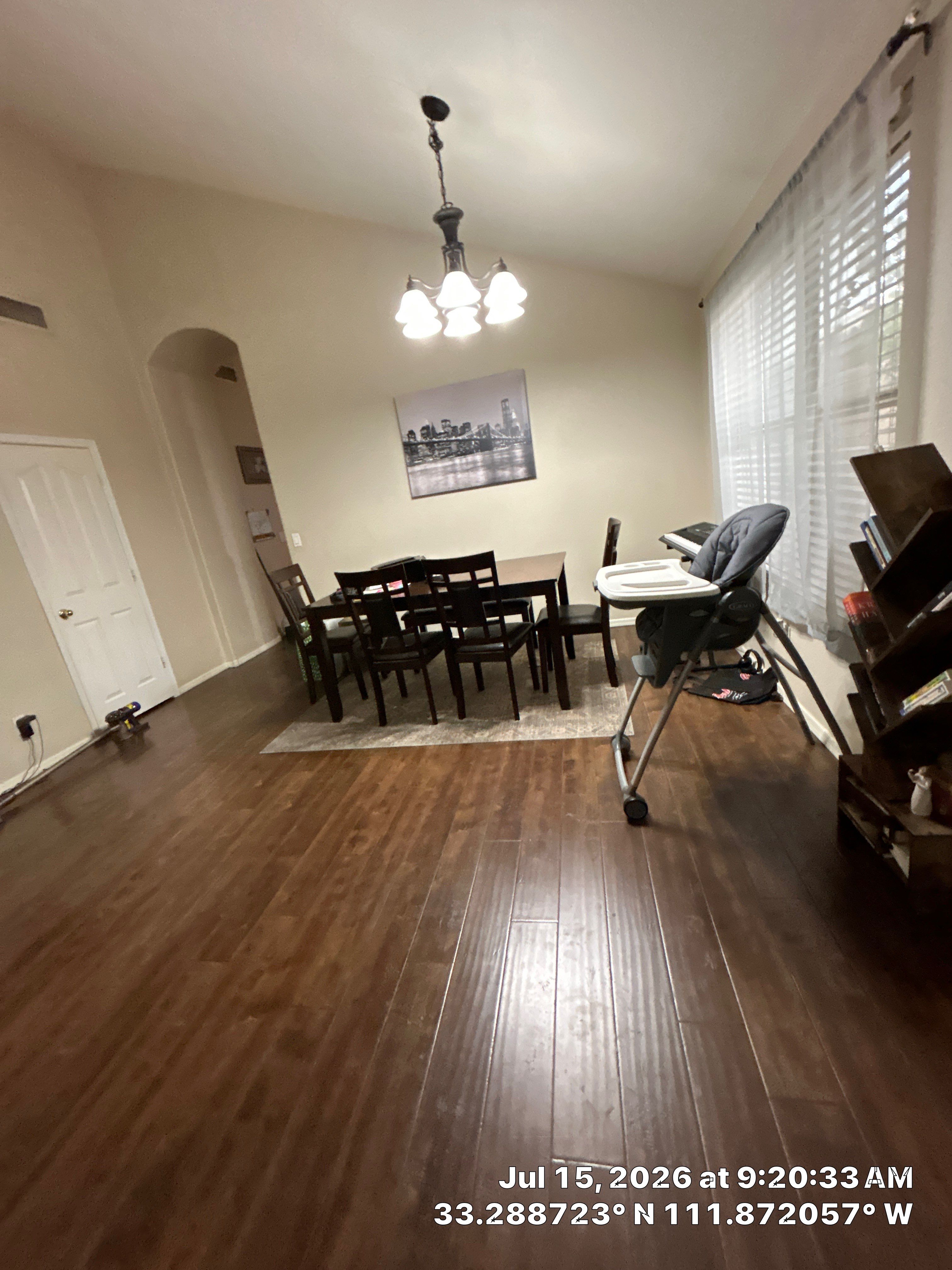 Dark Wood Laminate Flooring Installation for Chandler Dining Room by CompanyCam Sales Demo