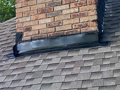 Cricket and Flashing Repair  by Rhino Roofing and General Contracting, LLC