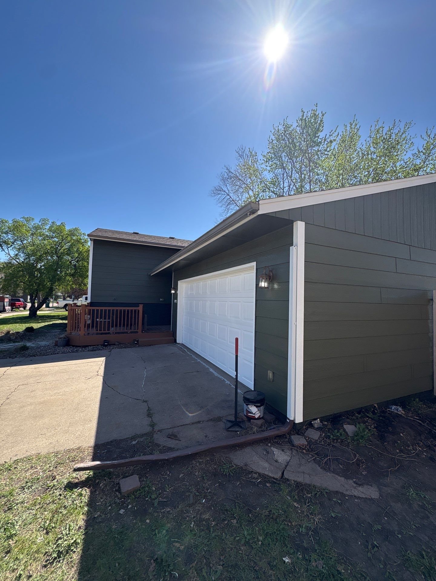Full Exterior House Painting and Foundation Refinishing in Sioux Falls by Select Painting, Coatings & Garage Cabinets