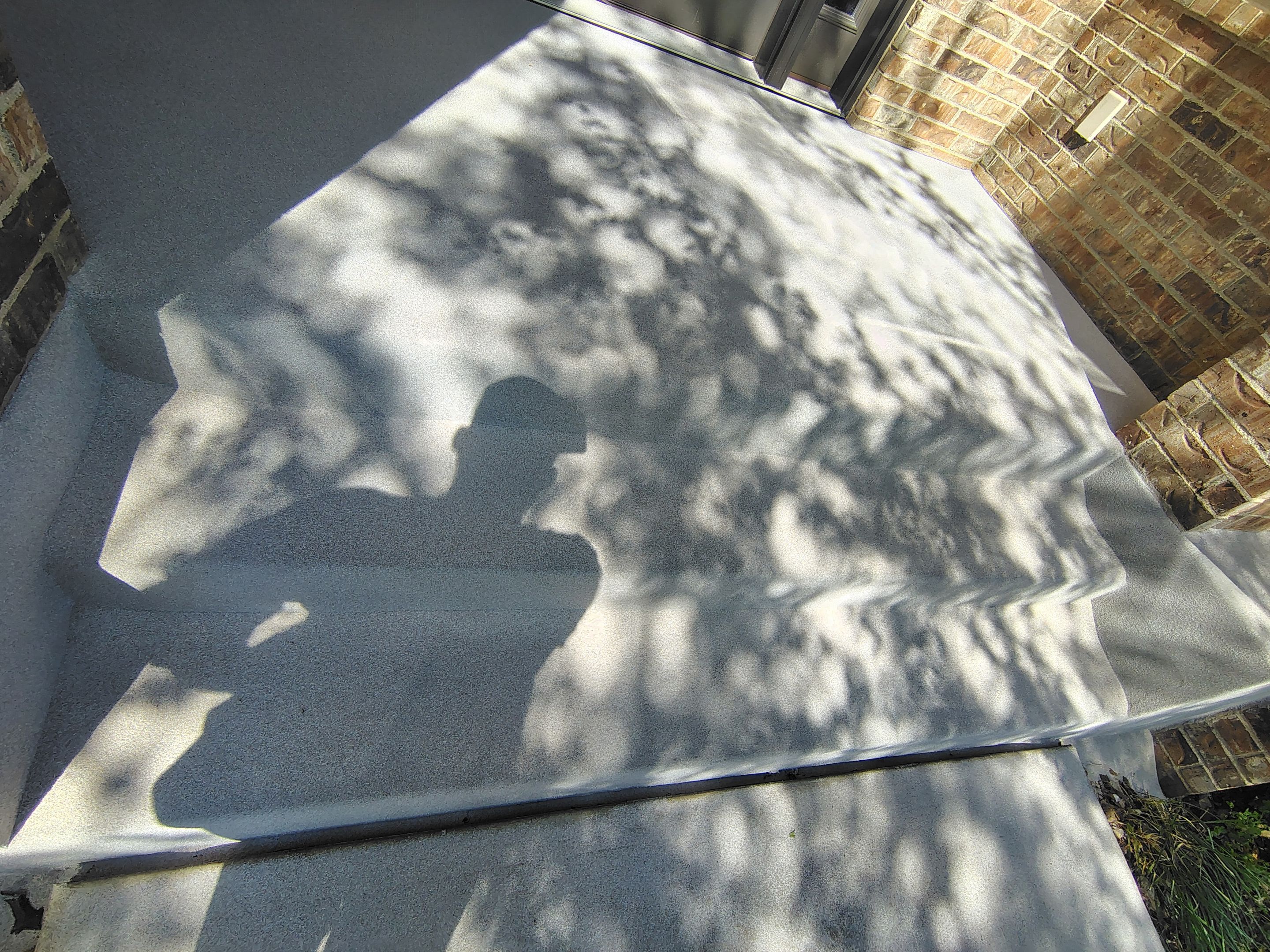 Front Porch Concrete Coating and Restoration in Harrisburg by Select Painting, Coatings & Garage Cabinets