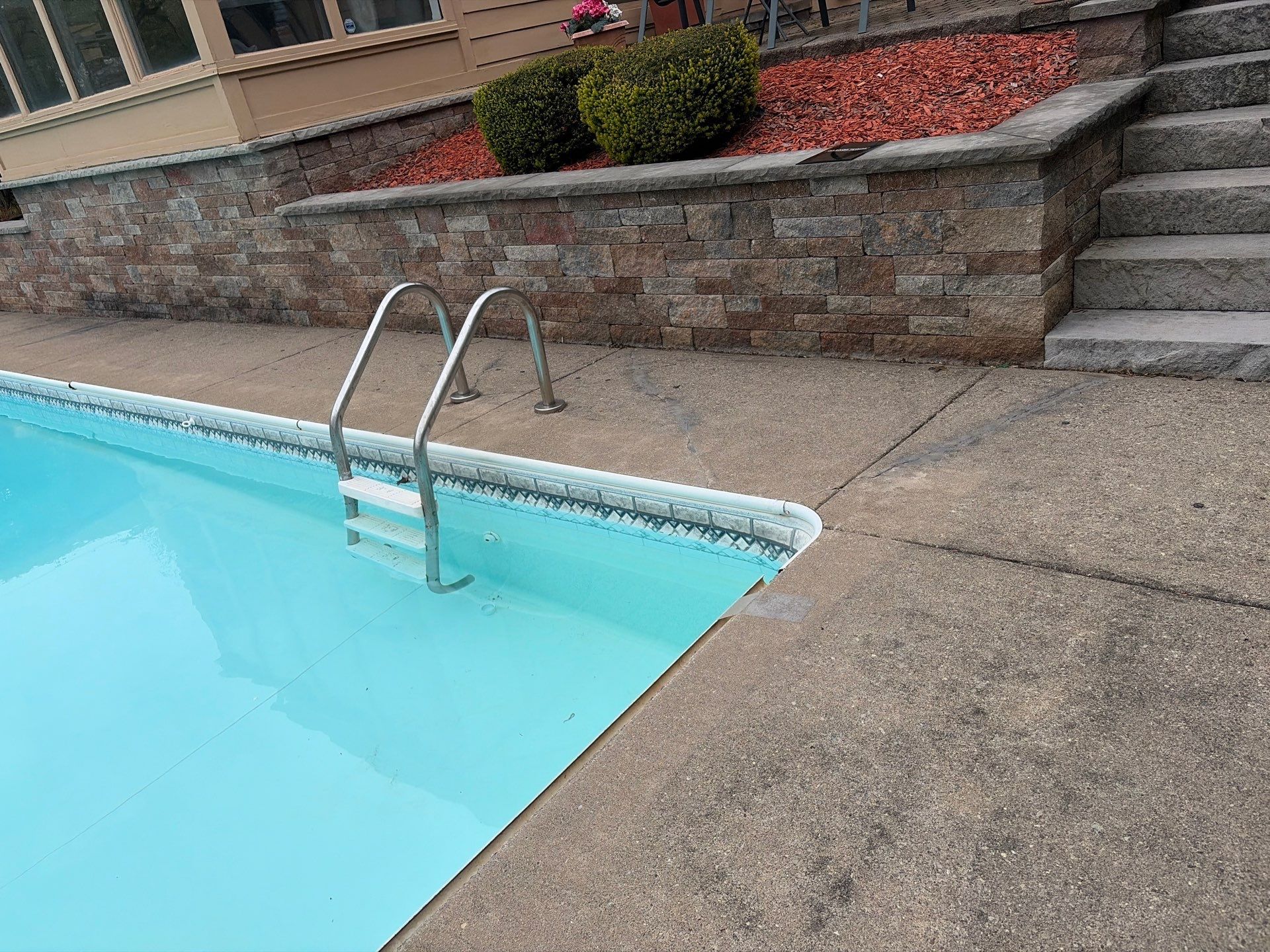 Vintage Shalestone Pool Deck by NG Masonry & Construction LLC