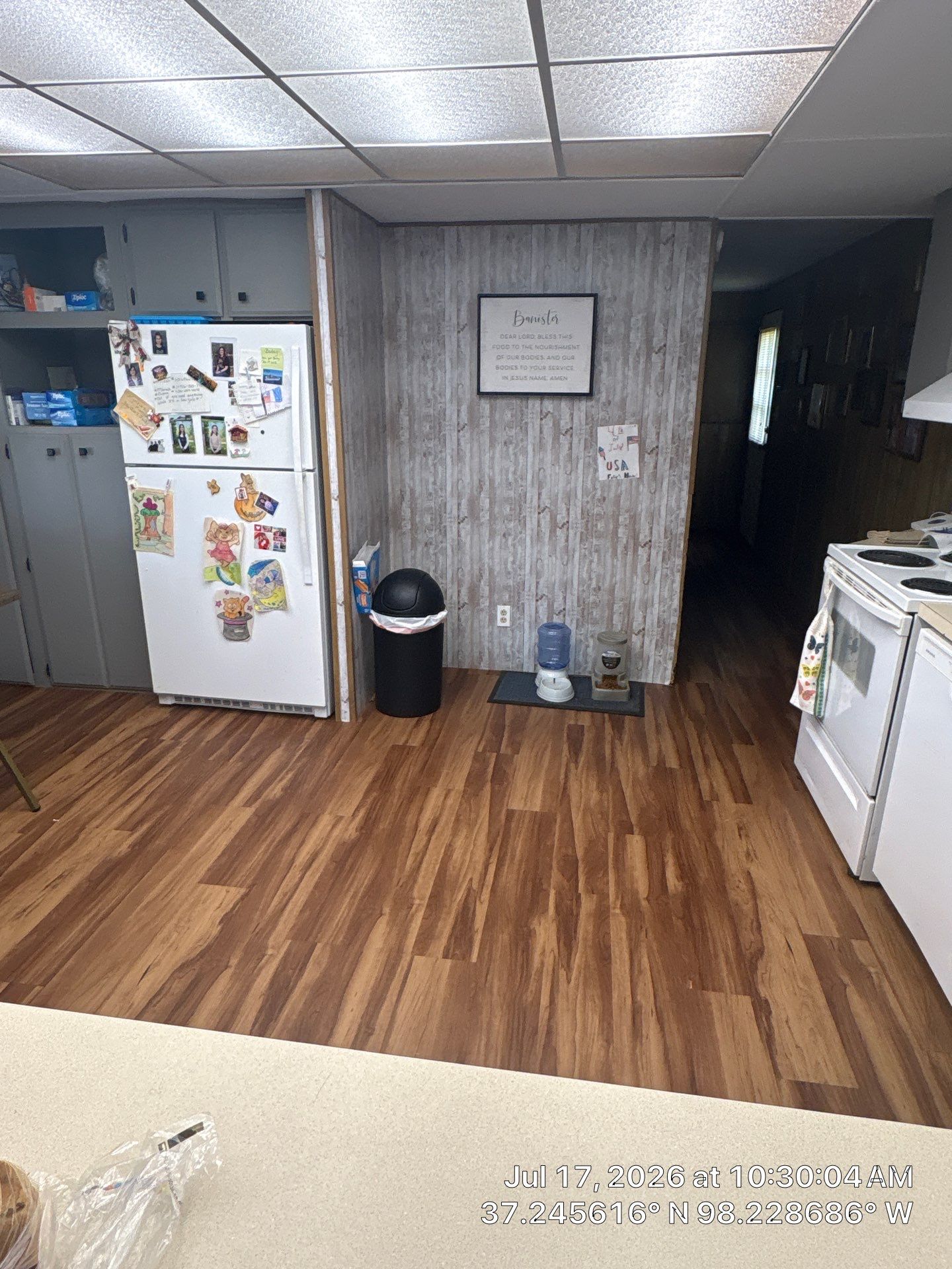 Attica Kitchen Remodel Featuring Gray Cabinets and Glass Tile Backsplash by CompanyCam Sales Demo