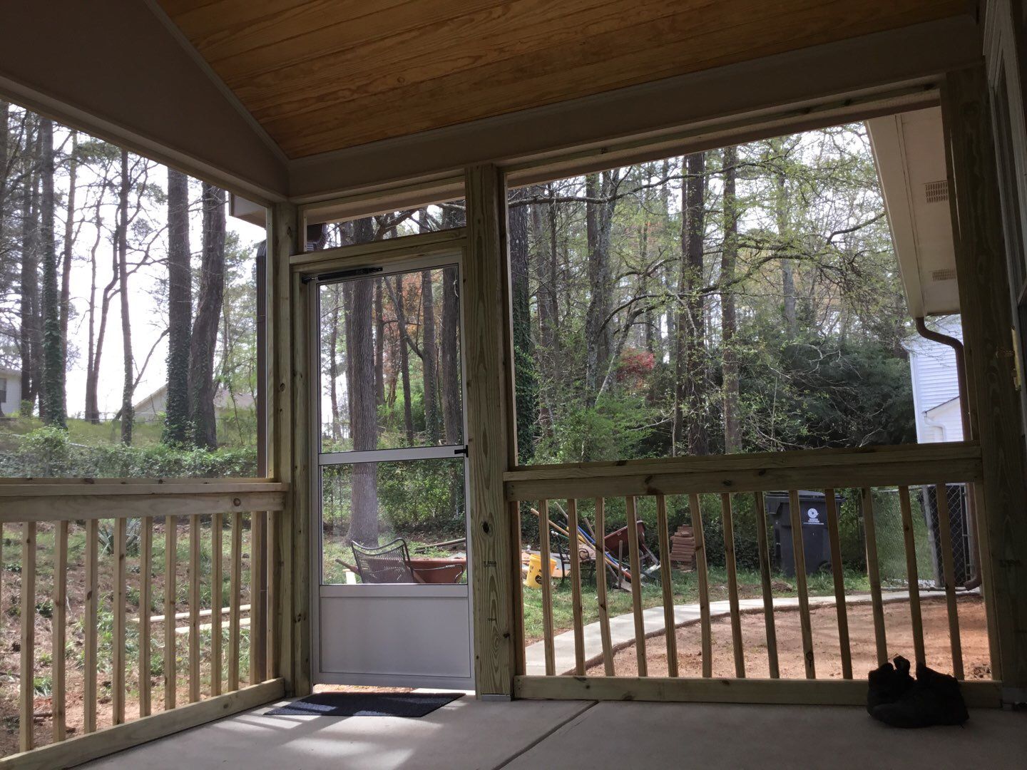 Screened Porch Construction with Vaulted Wood Ceiling in Douglasville by Swift Home Renovations