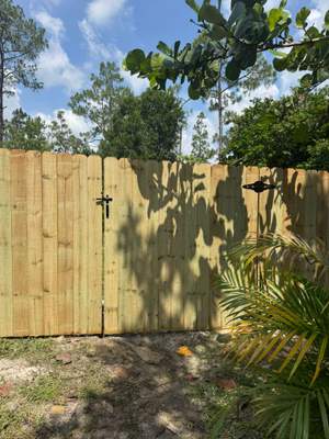 Pressure-Treated Wood Privacy Fence with Dog-Ear Pickets in Lehigh Acres