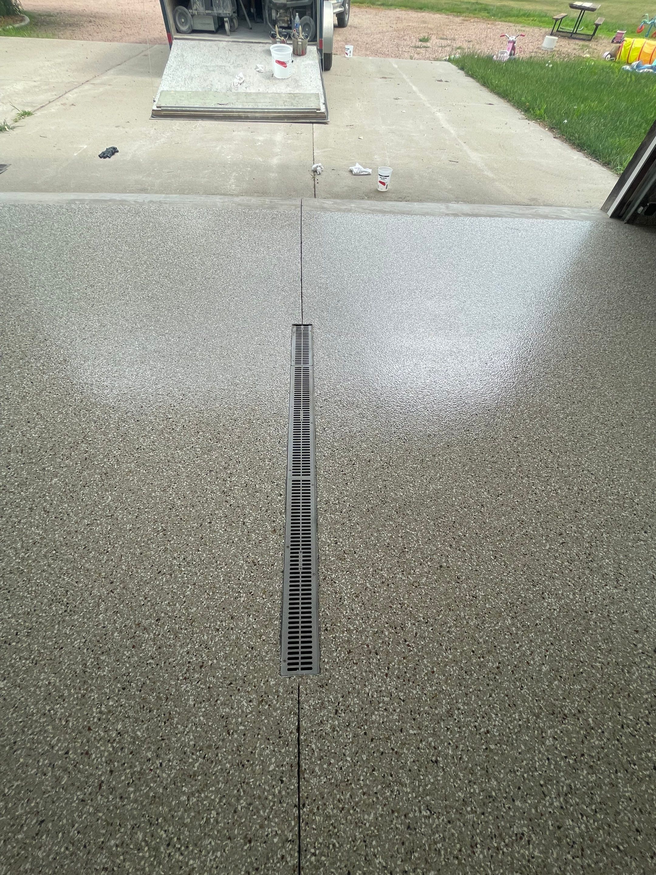 Hartford Residential Garage Floor Transformation With Decorative Chip Coating by Select Painting, Coatings & Garage Cabinets