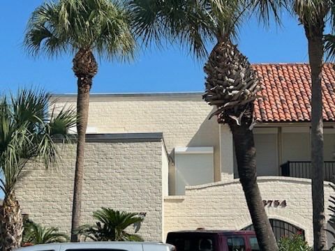 Off with the Tile and on with the TILCOR stone coated metal.  by Bayfront Roofing and Construction