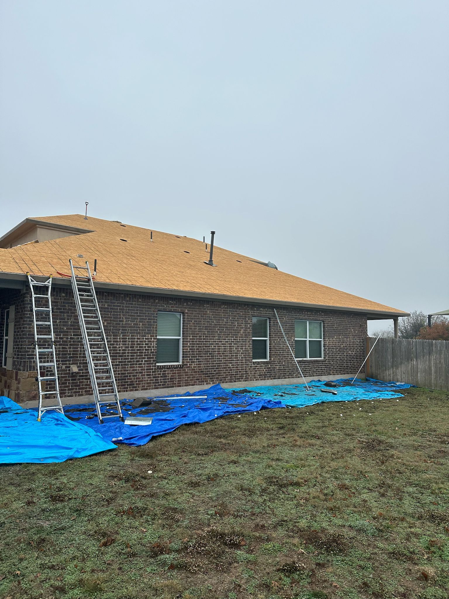 Architectural Shingle Roof Replacement Following Hail Damage in Round Rock by Caliber Restoration LLC