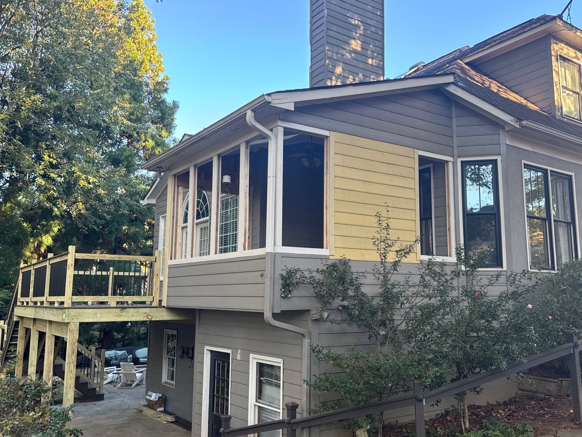 Custom Multi-Level Composite Deck and Sunroom Addition in Suwanee by Swift Home Renovations 