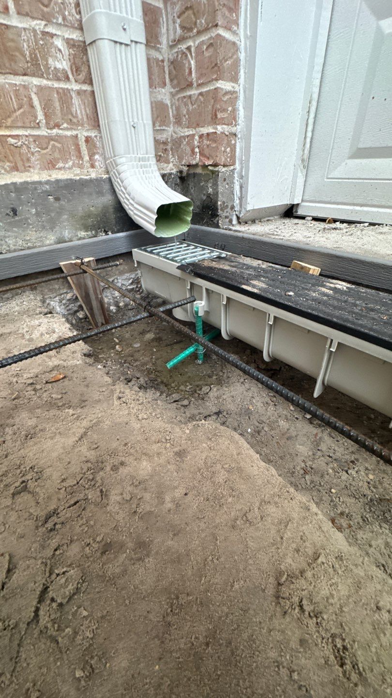 Driveway Concrete Replacement & French Drainage System by Texas Urban Elements