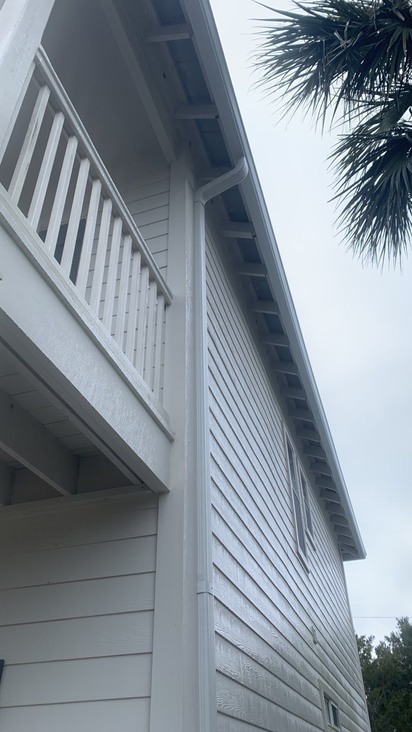 Seamless Gutter Installation Using White K-Style Gutters by Gutter Professors