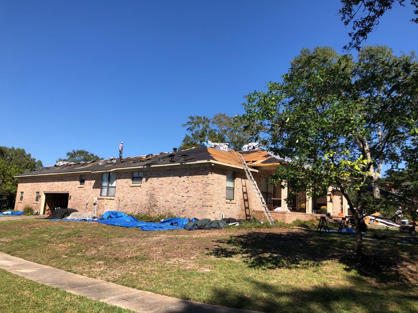 Residential Roofing Installation using Roof Replacement by American Roofing & Construction LLC