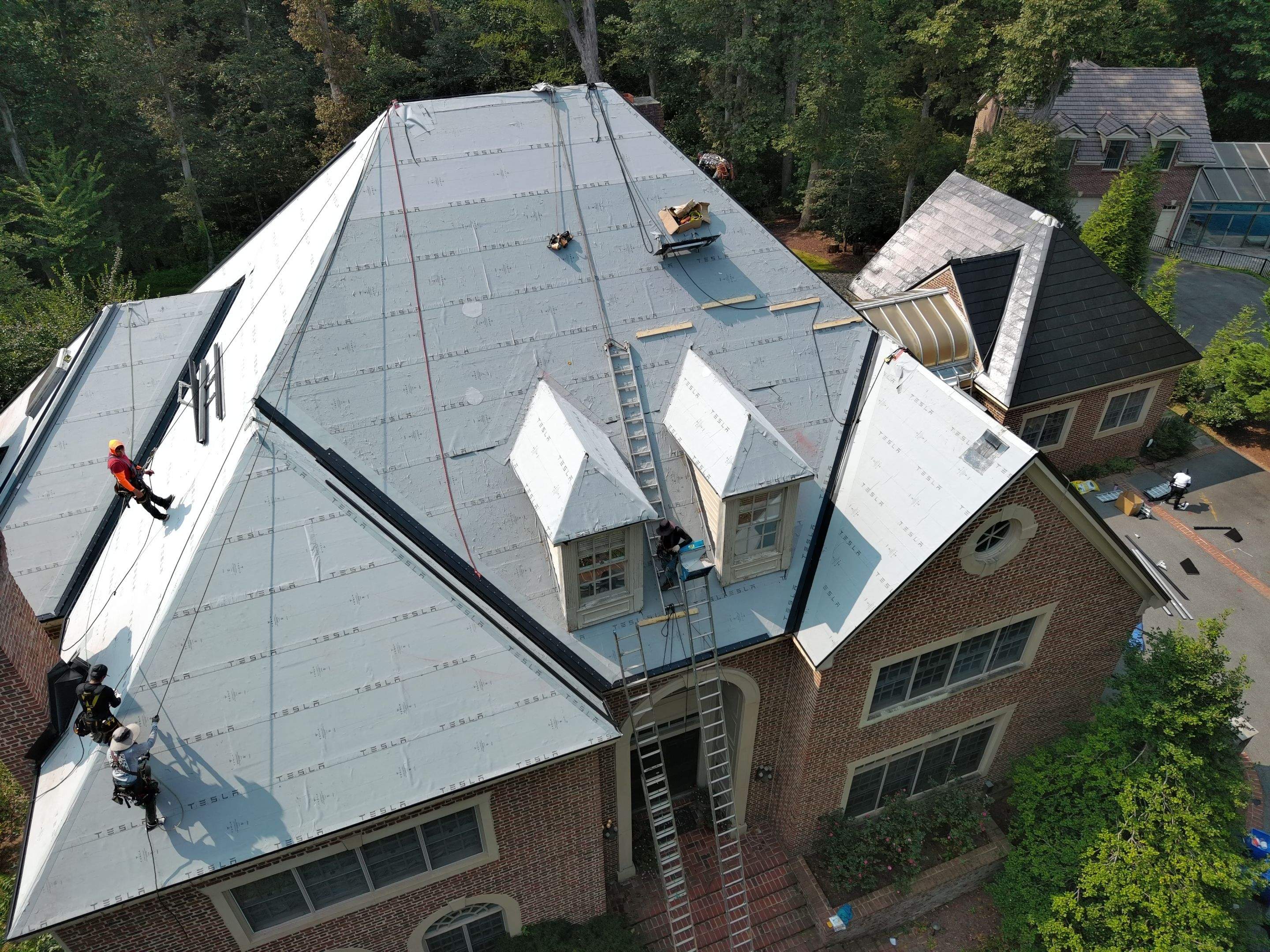 Extravagant Tesla Solar Roof in Maryland by American Home Contractors
