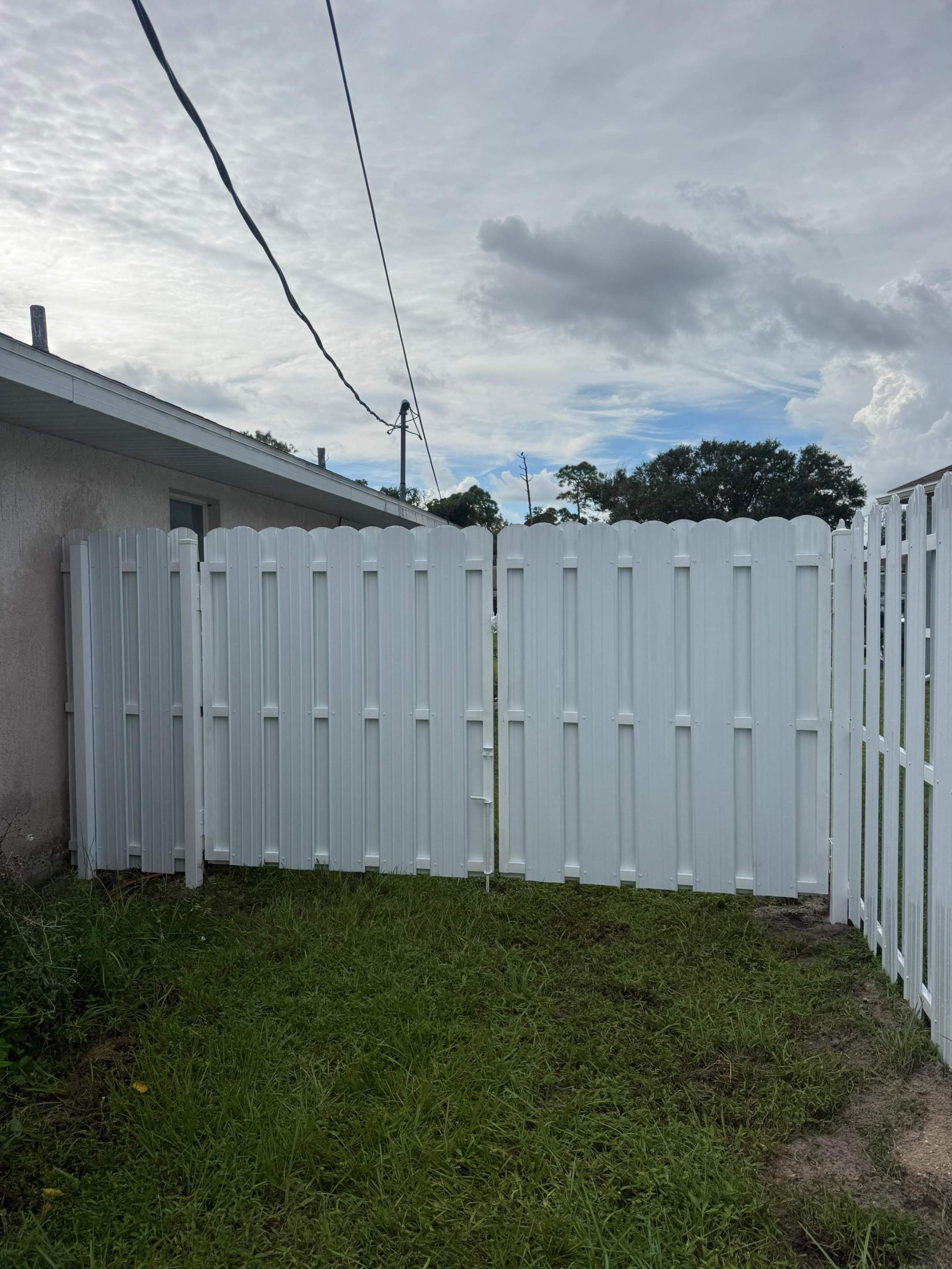 White Vinyl Privacy Fence Installation in North Port by True Fence LLC