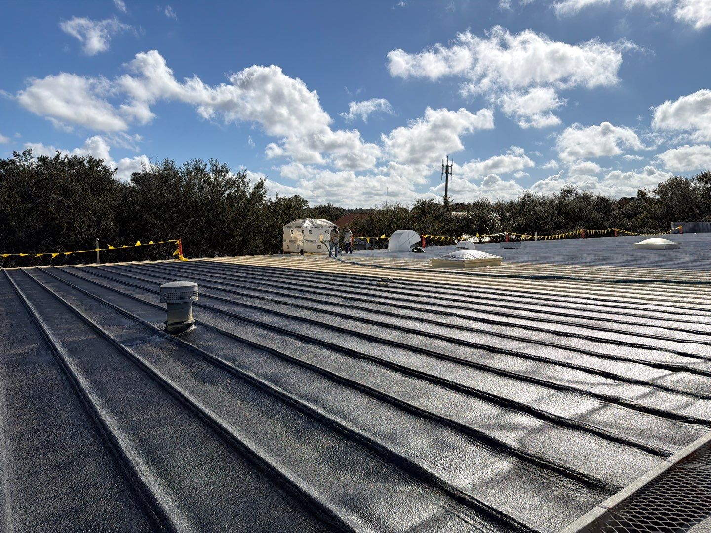 Sarasota Industrial Warehouse Metal Roof Silicone Coating Restoration by CES Roofing