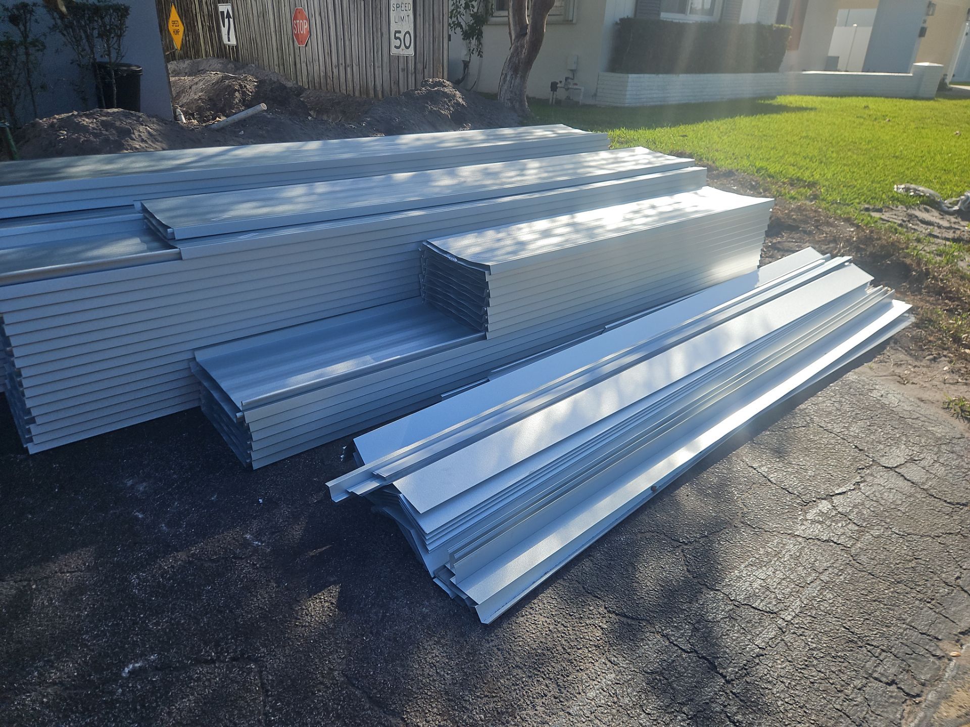 Residential Roofing Installation using 1.5'' Mechanical Seam by BLUES BROTHERS ROOFING