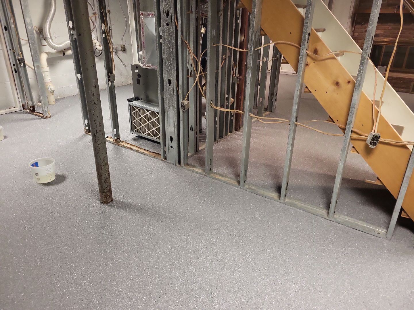 Basement Concrete Floor Coating with Penntek Flake System by Spectrum Painting, LLC