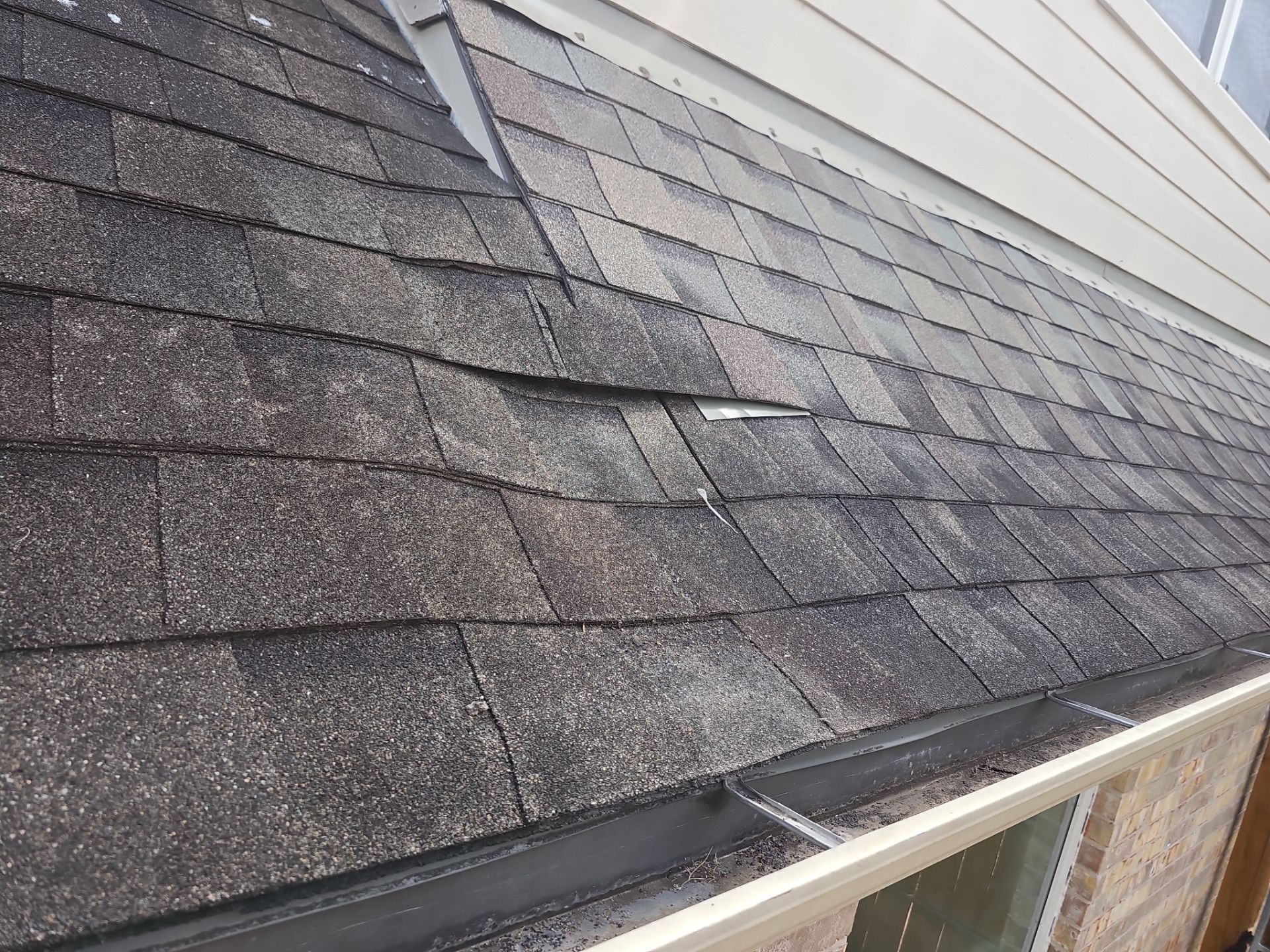 Hail Damage using Owen's Corning Duration (Lifetime) Shingles by Roof Repair Company