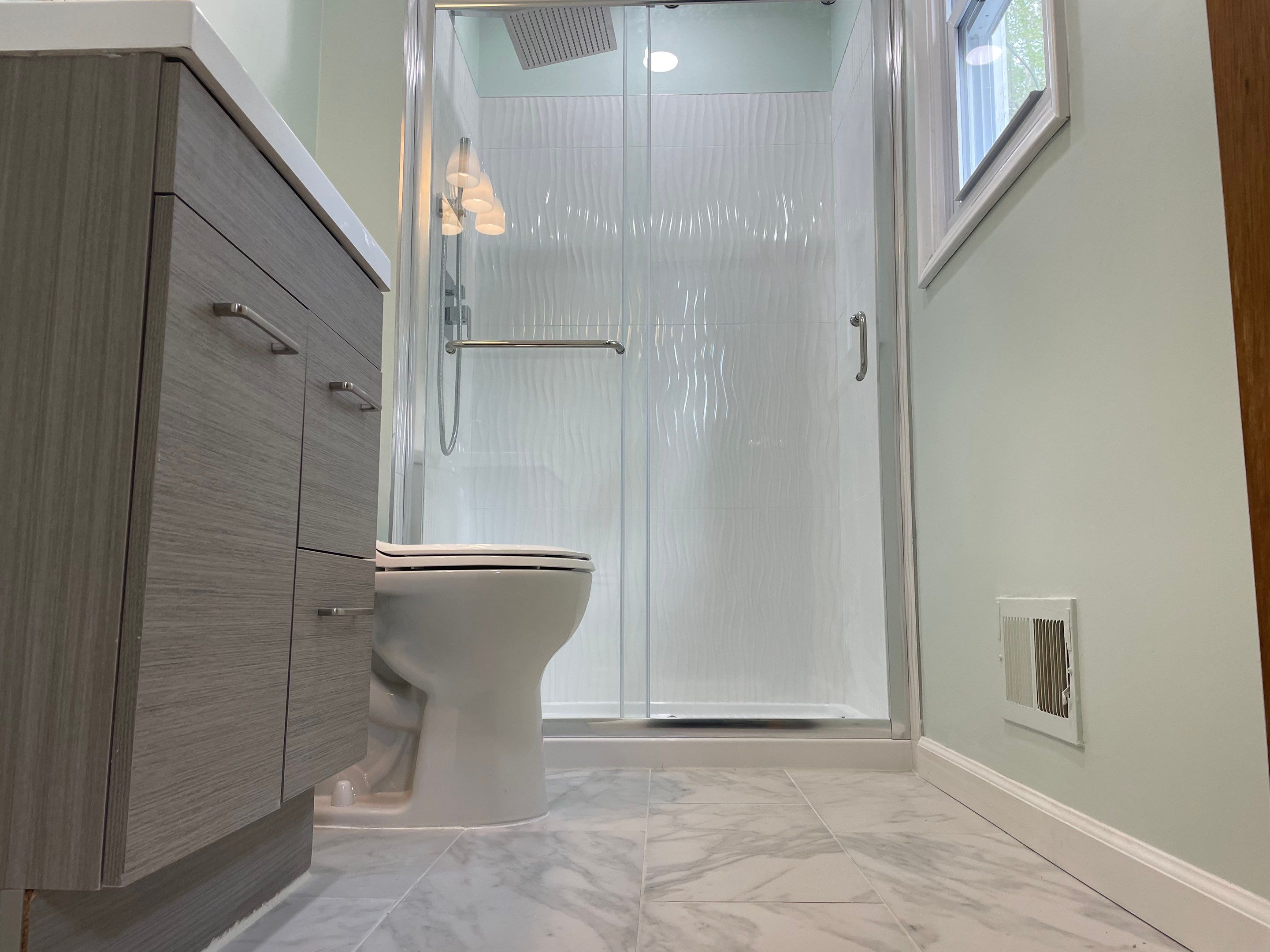 Bathroom Remodel using Tile by Home Concepts Construction