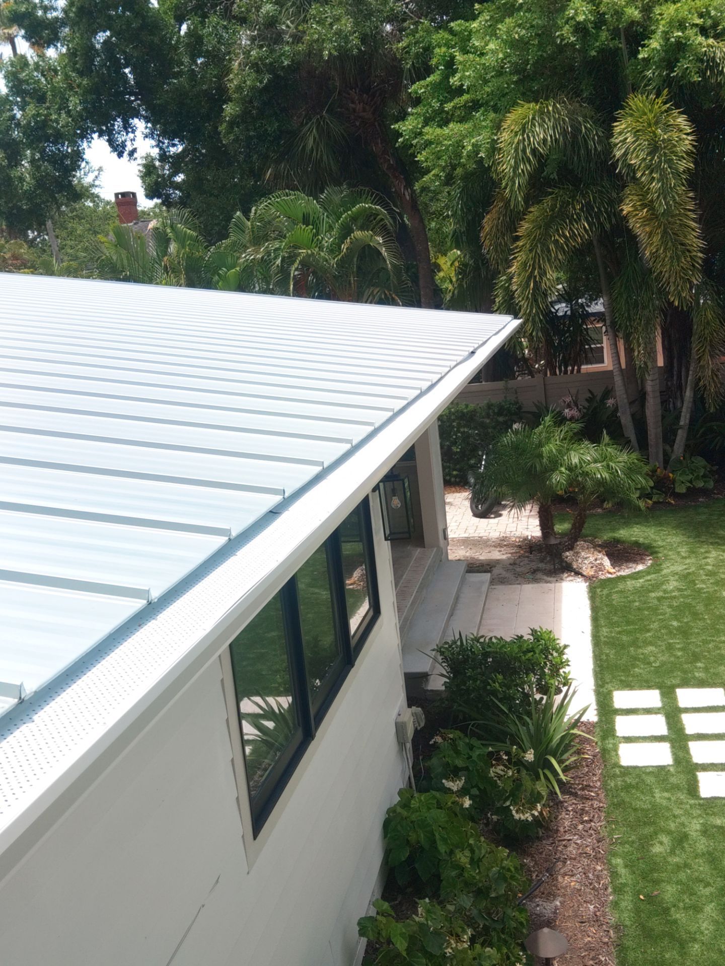 Aluminum Seamless Gutters using 3X4 Elbow Downspout in Sarasota FL by Gutter Professors