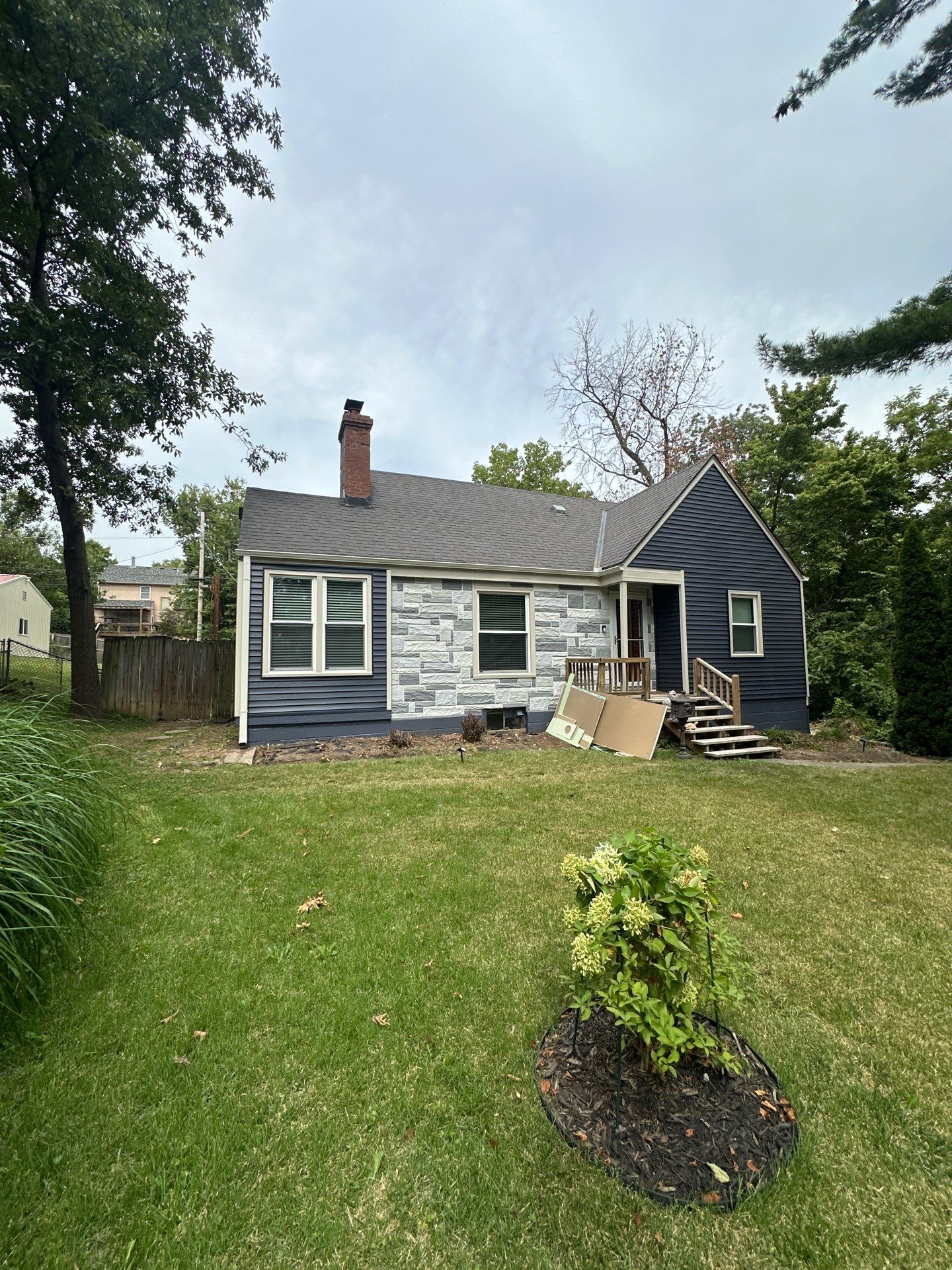 Kansas City Indigo Insulated Craneboard Siding and Window Replacement Project in Kansas City by EEC Windows, Siding & Roofing
