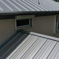 24ga 1.5" Mechanical Seam Silver Metallic by Total Roofing System The Metal Roof Experts