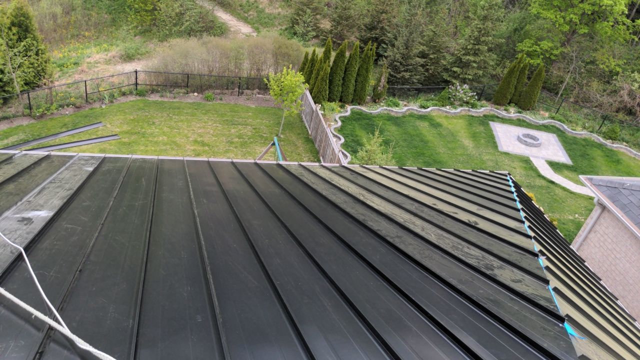 Residential Roofing Installation using 16" Standing Seam Panels by Jay Carter Roofing & Sheet Metal