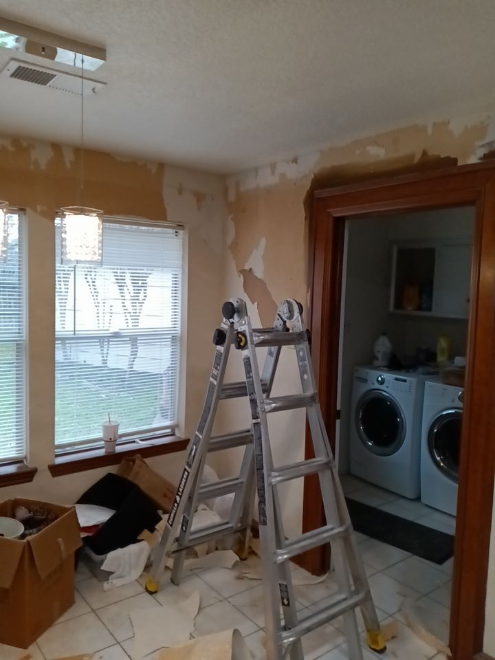Interior and exterior painting project by Roof Concepts Construction