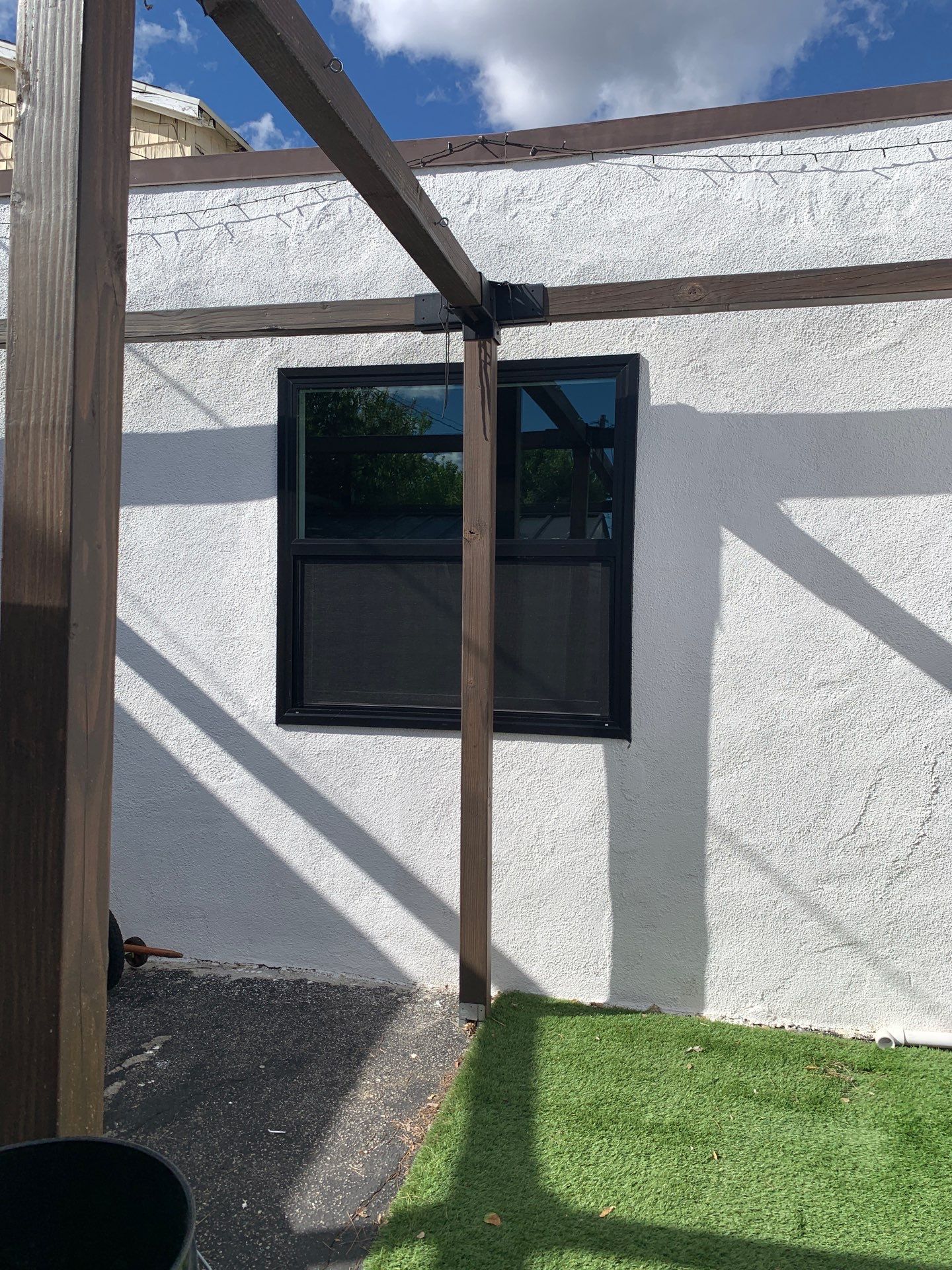 Window Installation using Black Anlin windows by American Window Company