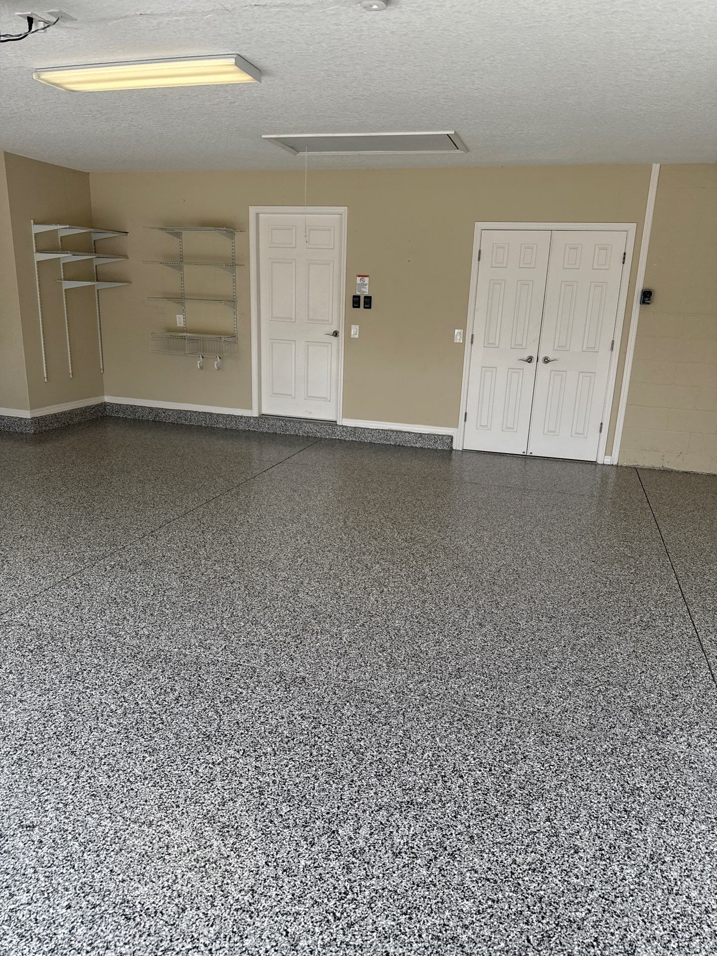 Garage in Domino by Innovative Concrete Coatings 