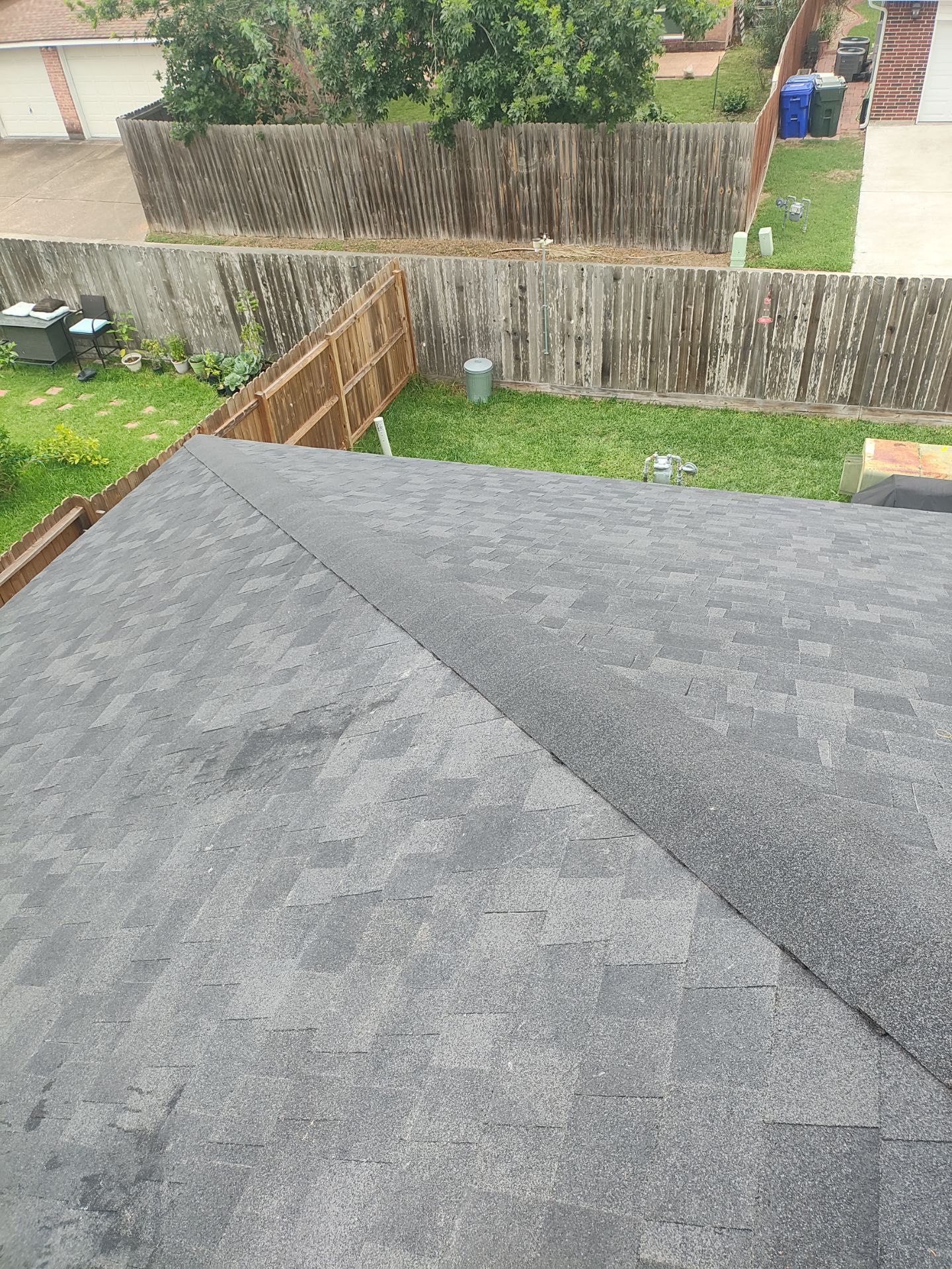 Nothing looks nicer than a little black roof by Bayfront Roofing and Construction