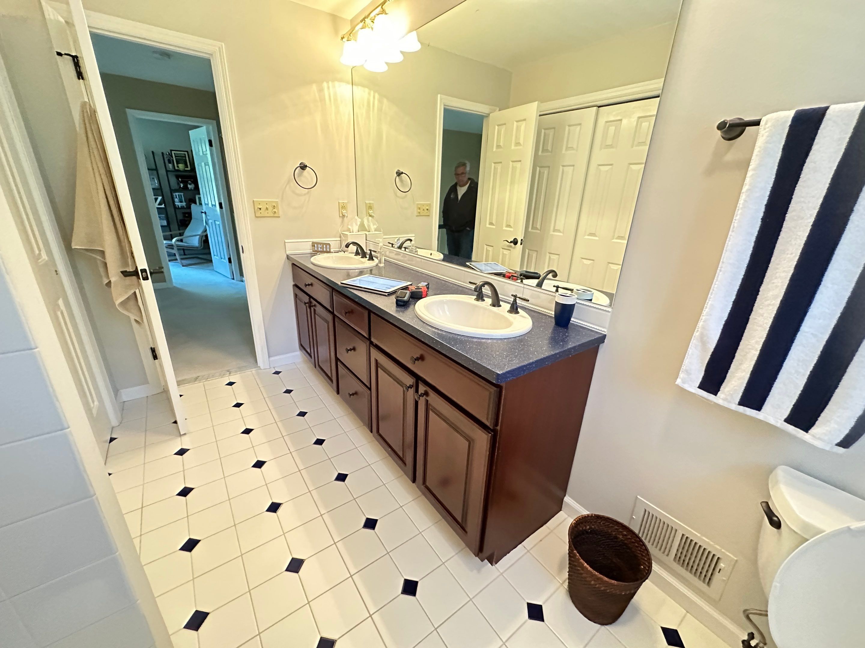 Bathroom Remodel using LVP Flooring by Home Concepts Construction