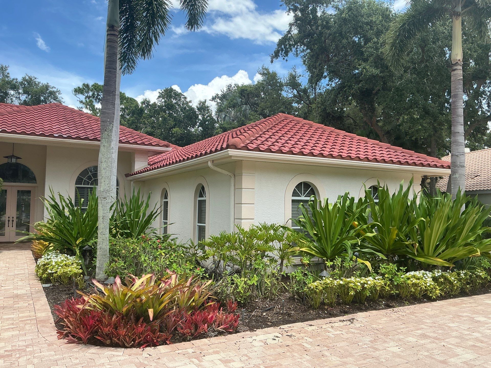 Splash Guard Gutters for Rainy Season Protection in Osprey FL by Gutter Professors