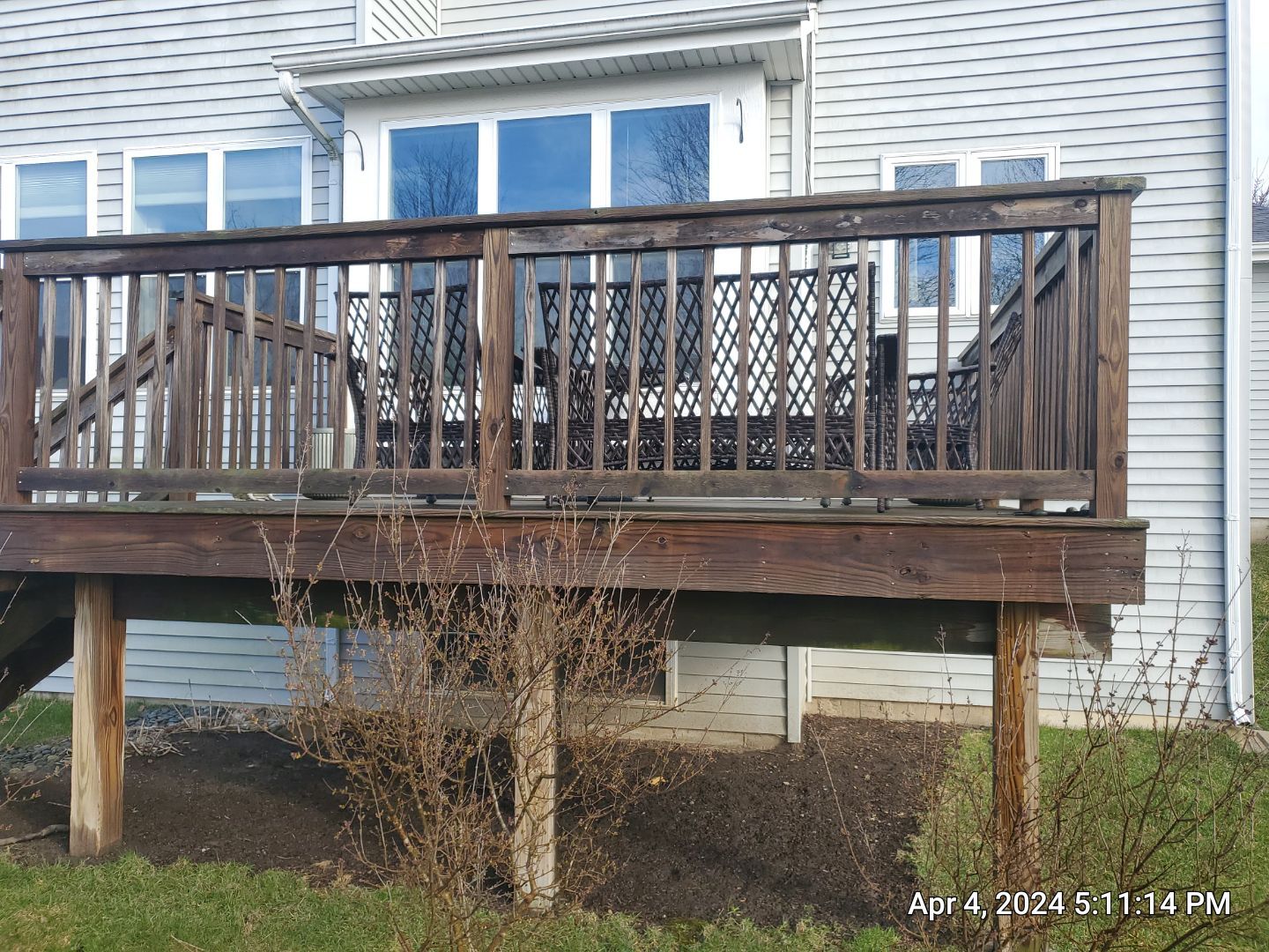 wood deck cleaning and staining by Northern Power Washing LLC.