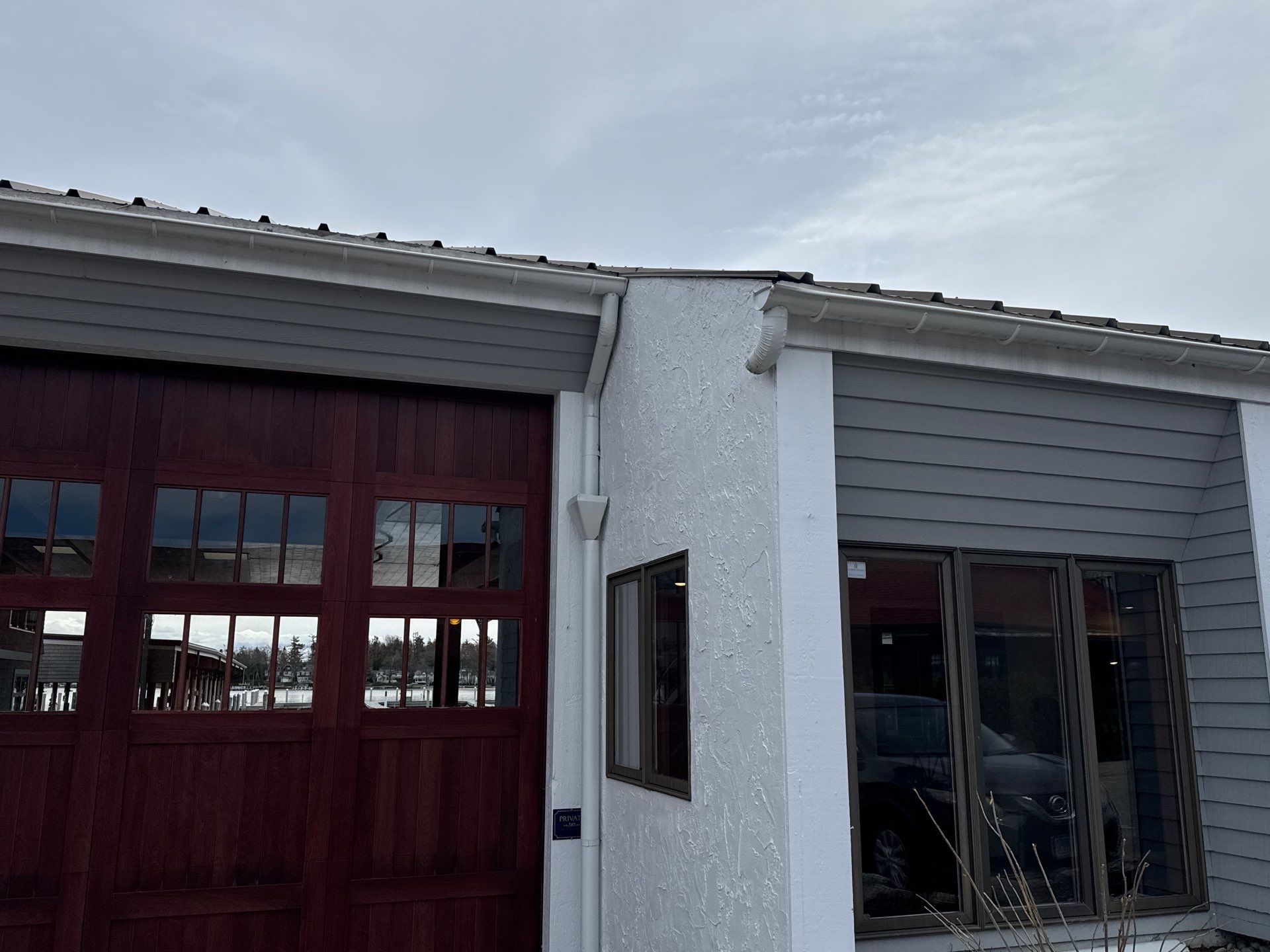 Gutter and Downspout Installation for Harbor Springs Boat House by Rainbow Seamless Systems