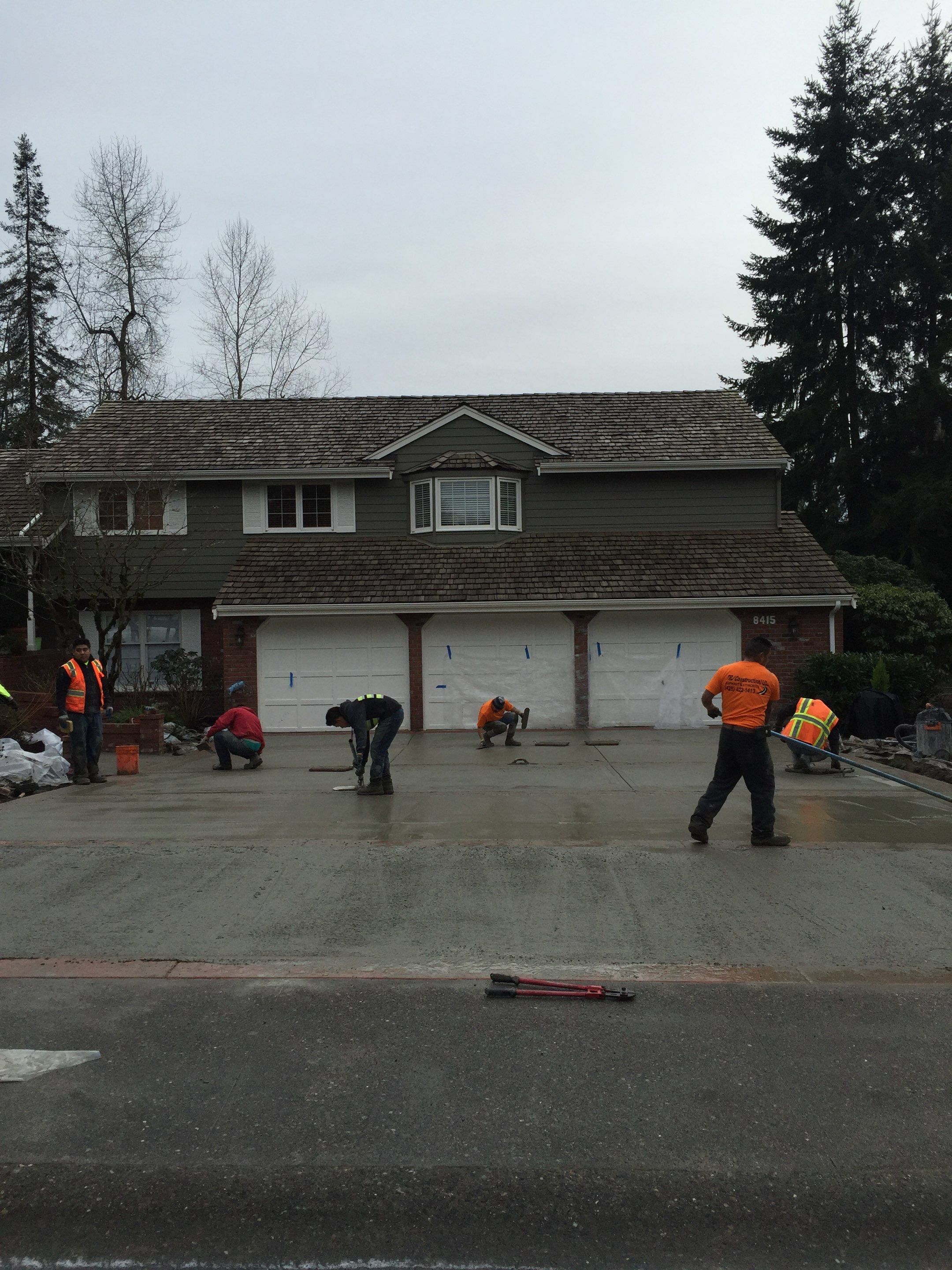 Custom Aggregate Driveway and Stamped Finish  by Jireh Asphalt & Concrete Inc 